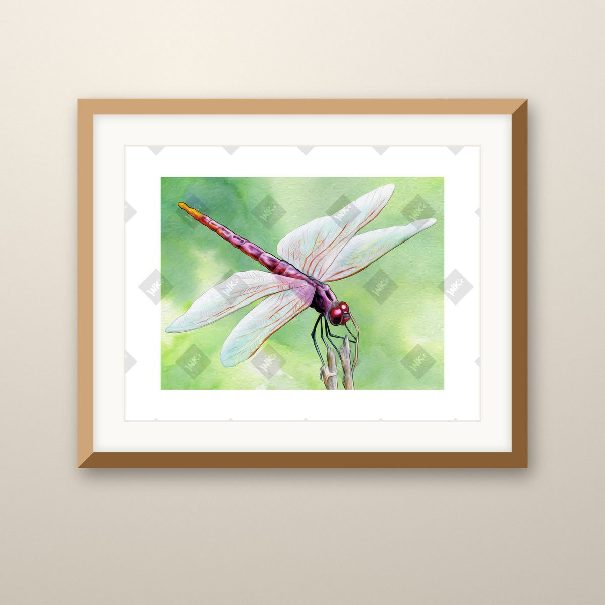 Dragonfly art print in an oak frame on a wall