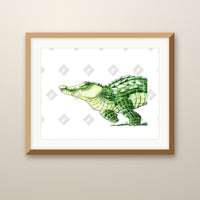 Alligator Stepping art print in an oak frame on a wall