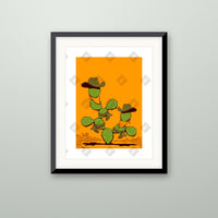 Orange Cactus art print in a black frame on a wall