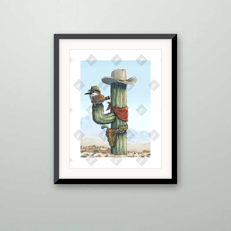 Sparrow Saguaro art print in a black frame on a wall