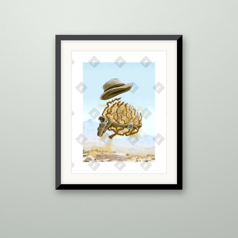 Tumbleweed art print in a black frame on a wall